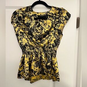 Papertee short sleeve blouse with shoulder pads and deep V neck‎